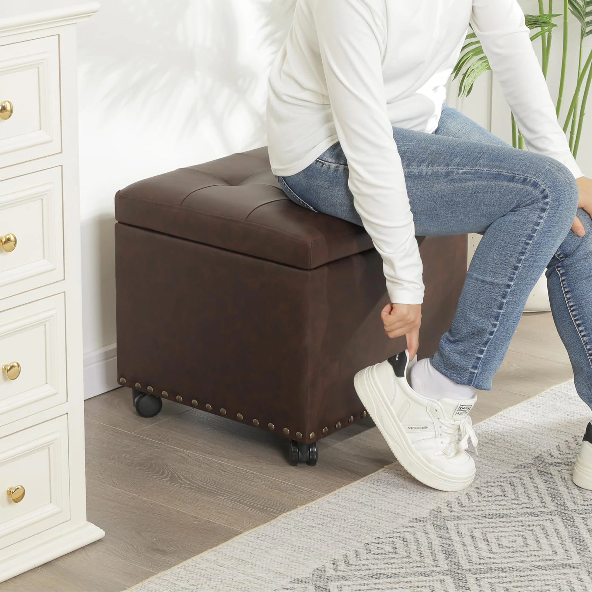 Adeco Brown With Wheels Tufted Faux Leather Storage Ottoman – lifestyle room view