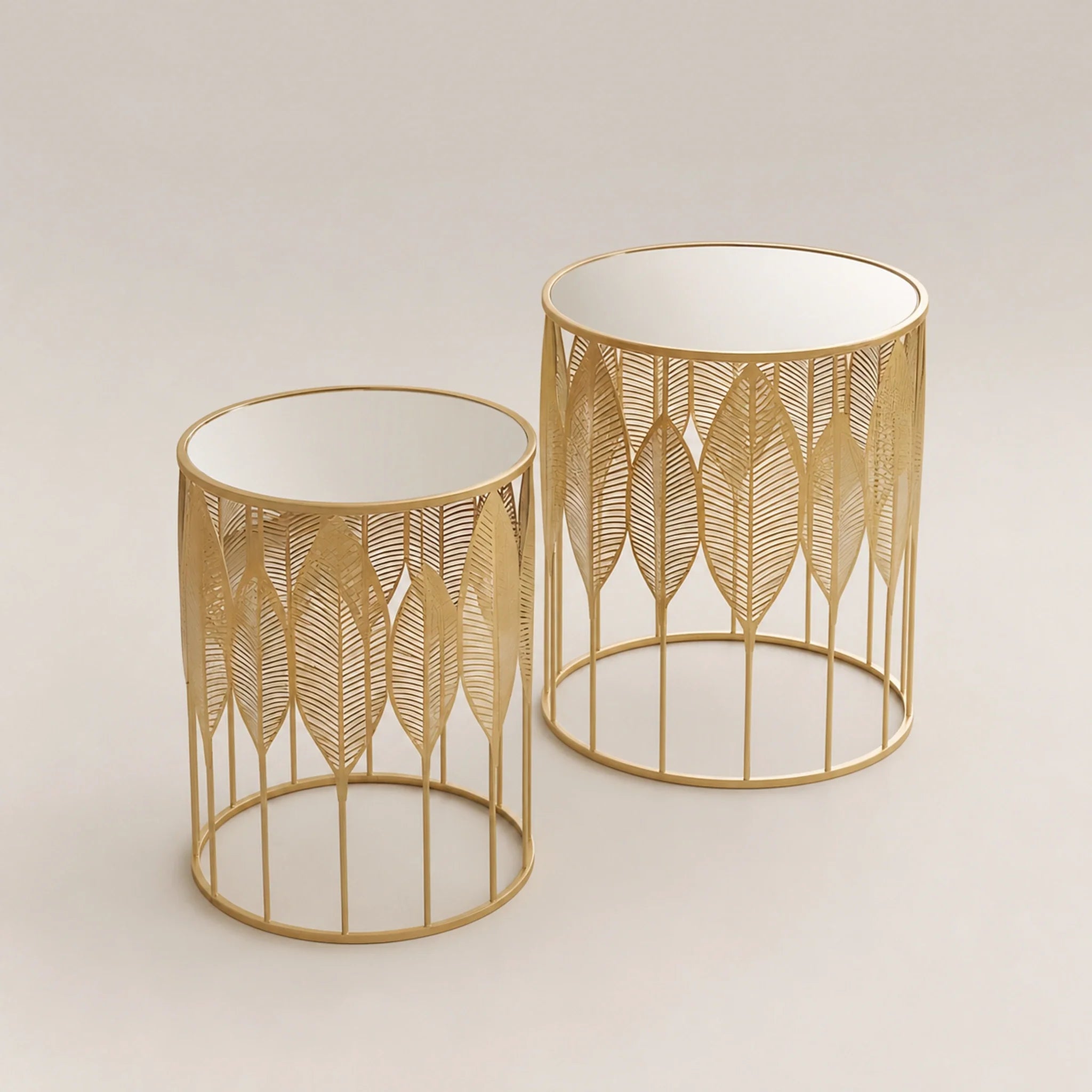 Homebeez Gold Leaf metal nesting tables – warm studio front view