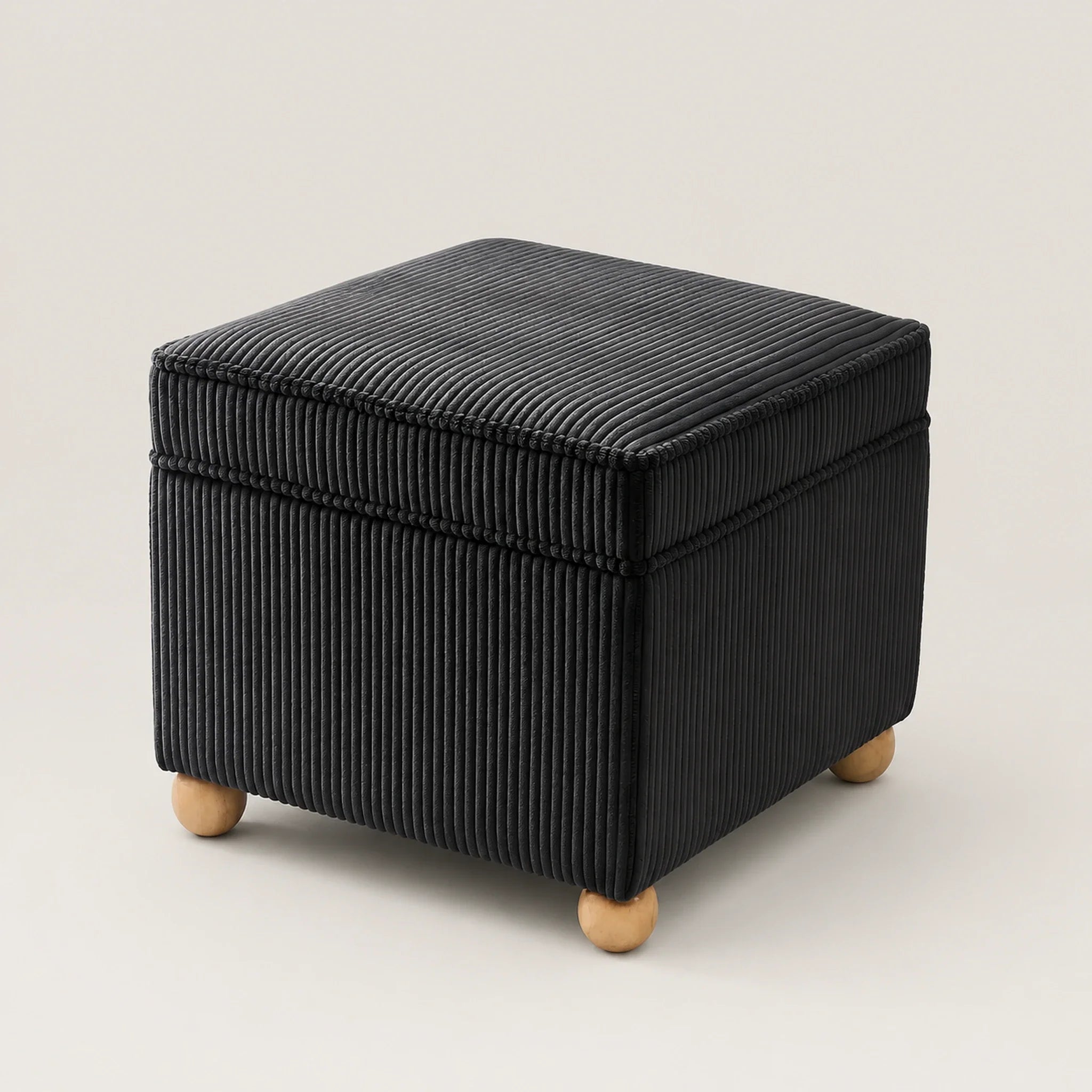 Adeco D Black storage ottoman – warm studio front view