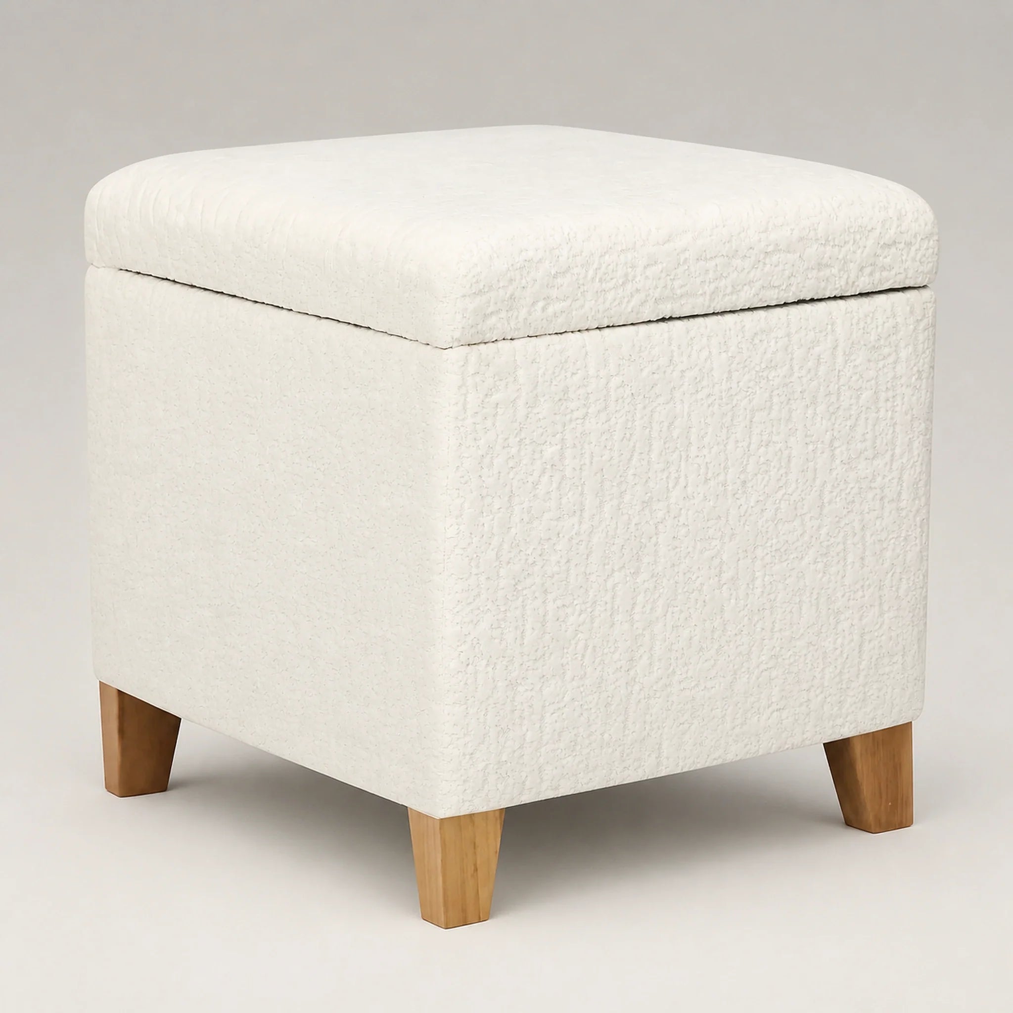 Adeco D Embossed White storage ottoman – warm studio front view
