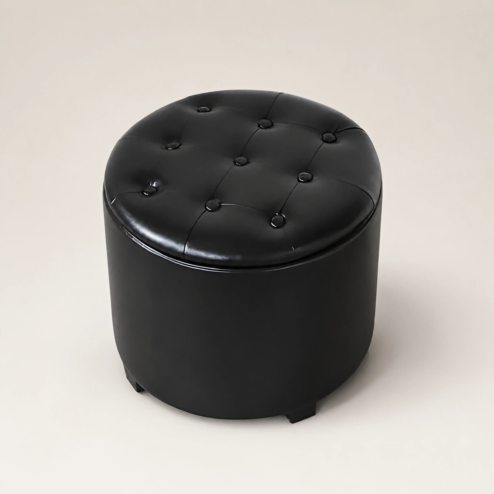 Beringia Black With Black Legs faux leather 18.5-inch storage ottoman – warm studio front view