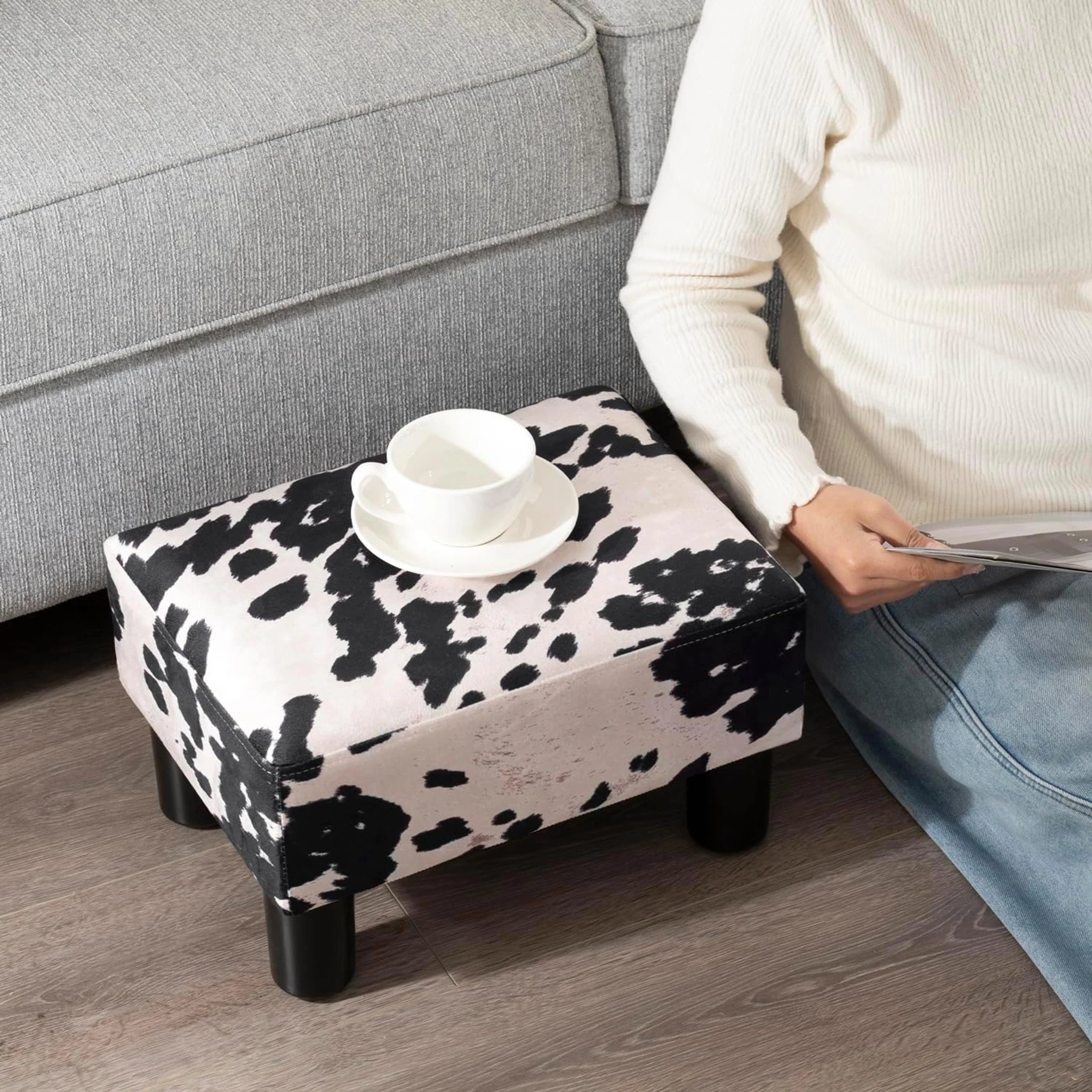 Adeco Cow Print Faux Leather Storage Ottoman – lifestyle room view