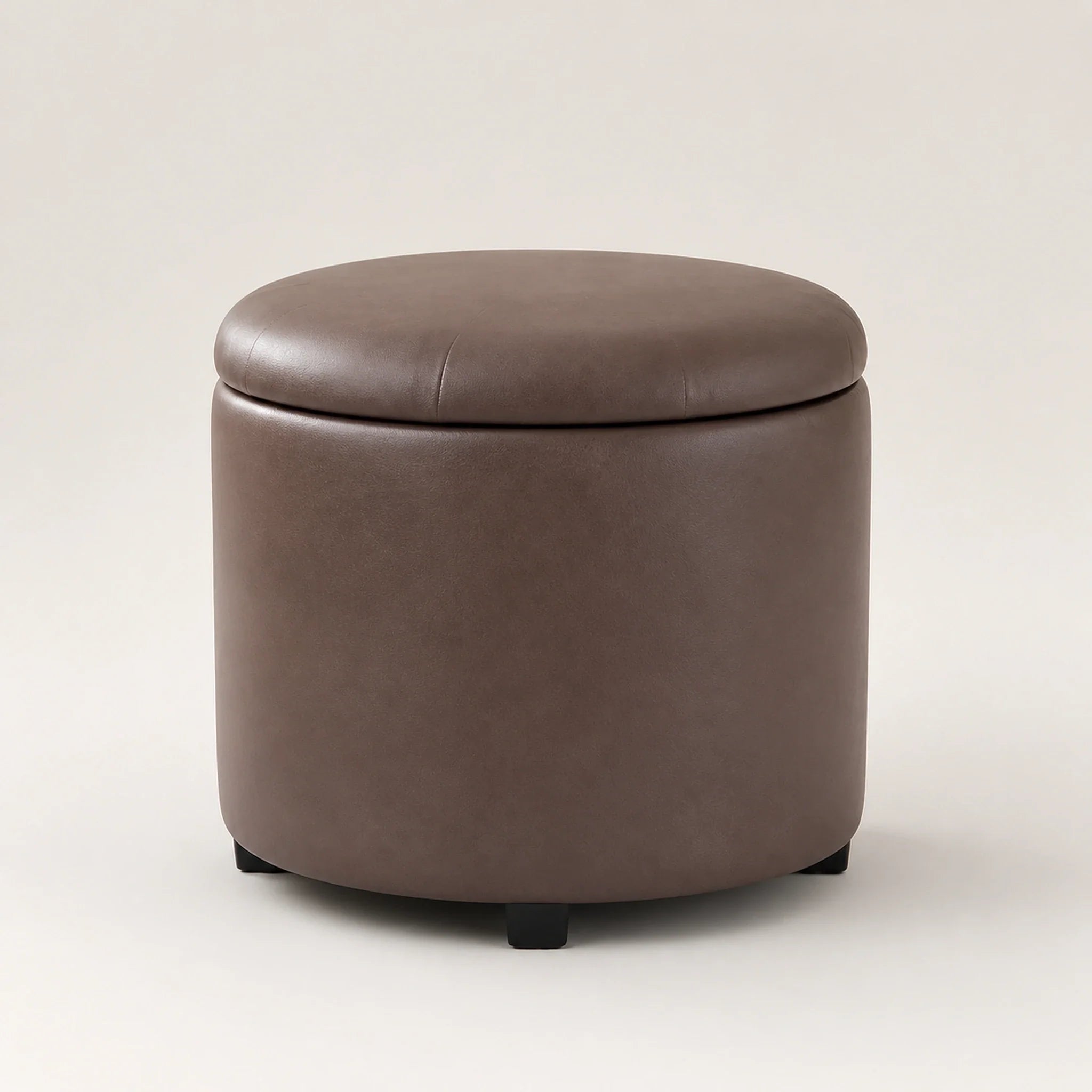 Adeco Dark Brown storage ottoman – warm studio front view