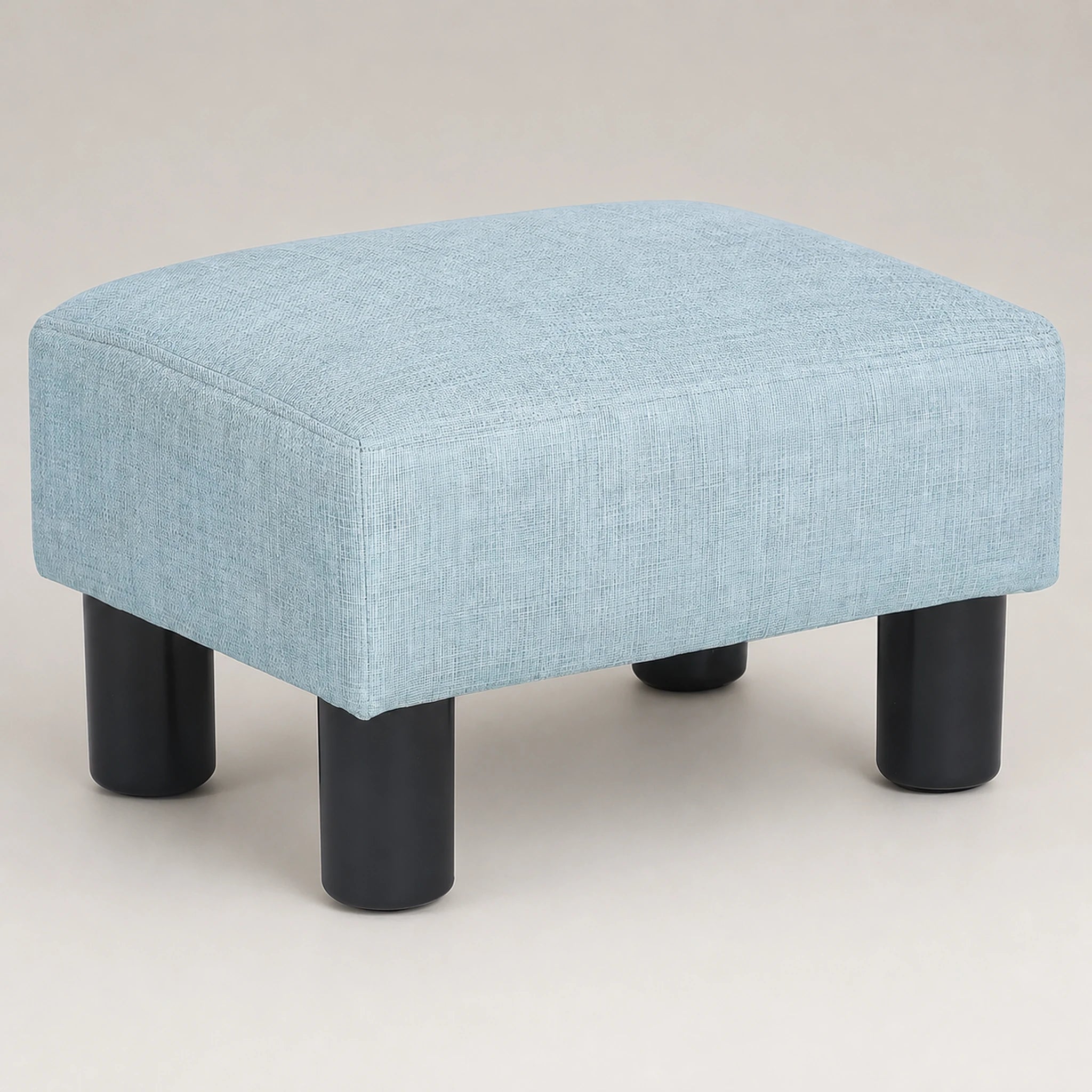 Beringia Light Blue faux leather 11-inch storage ottoman – warm studio front view
