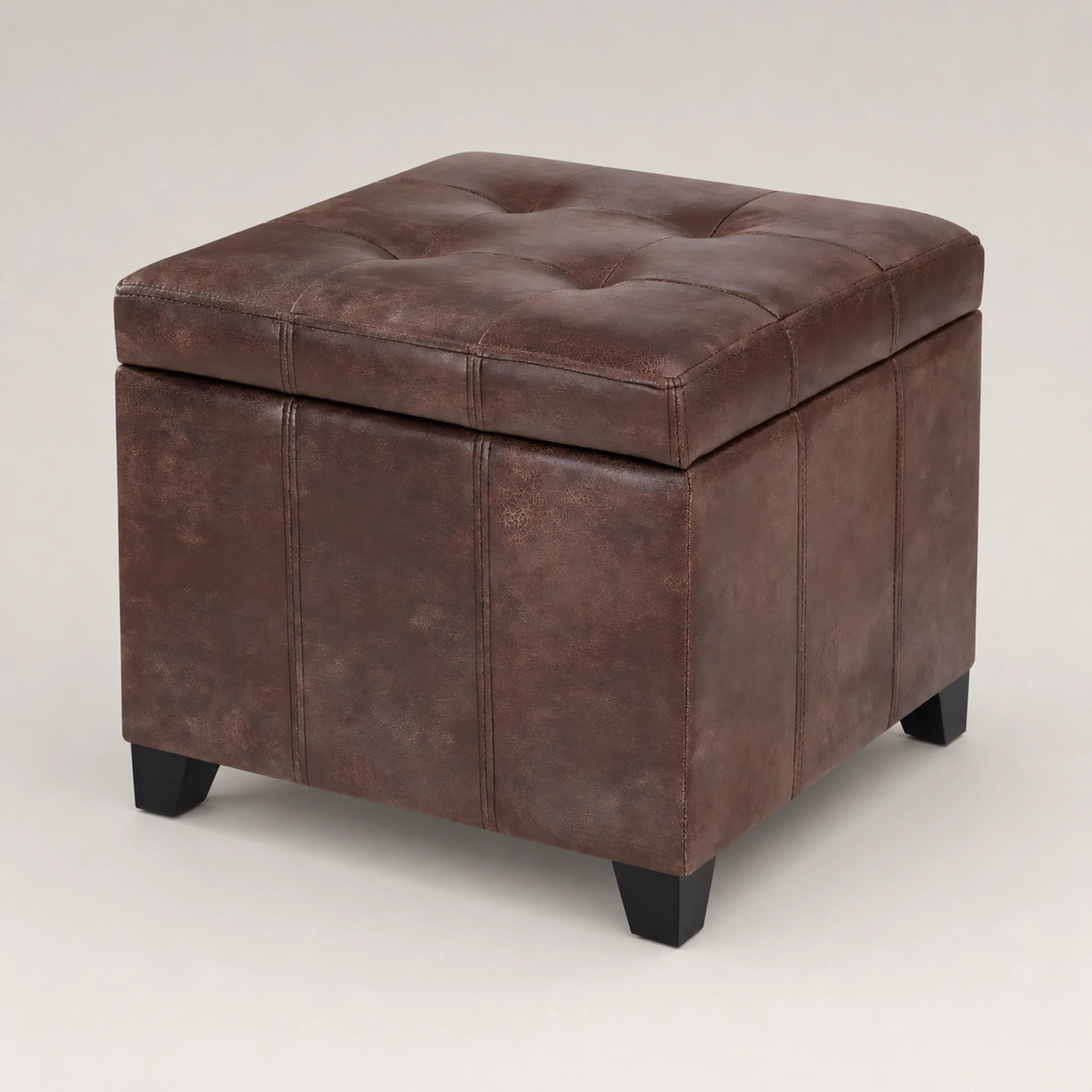 Beringia Vitage Brown faux leather 17.5-inch storage ottoman – warm studio front view