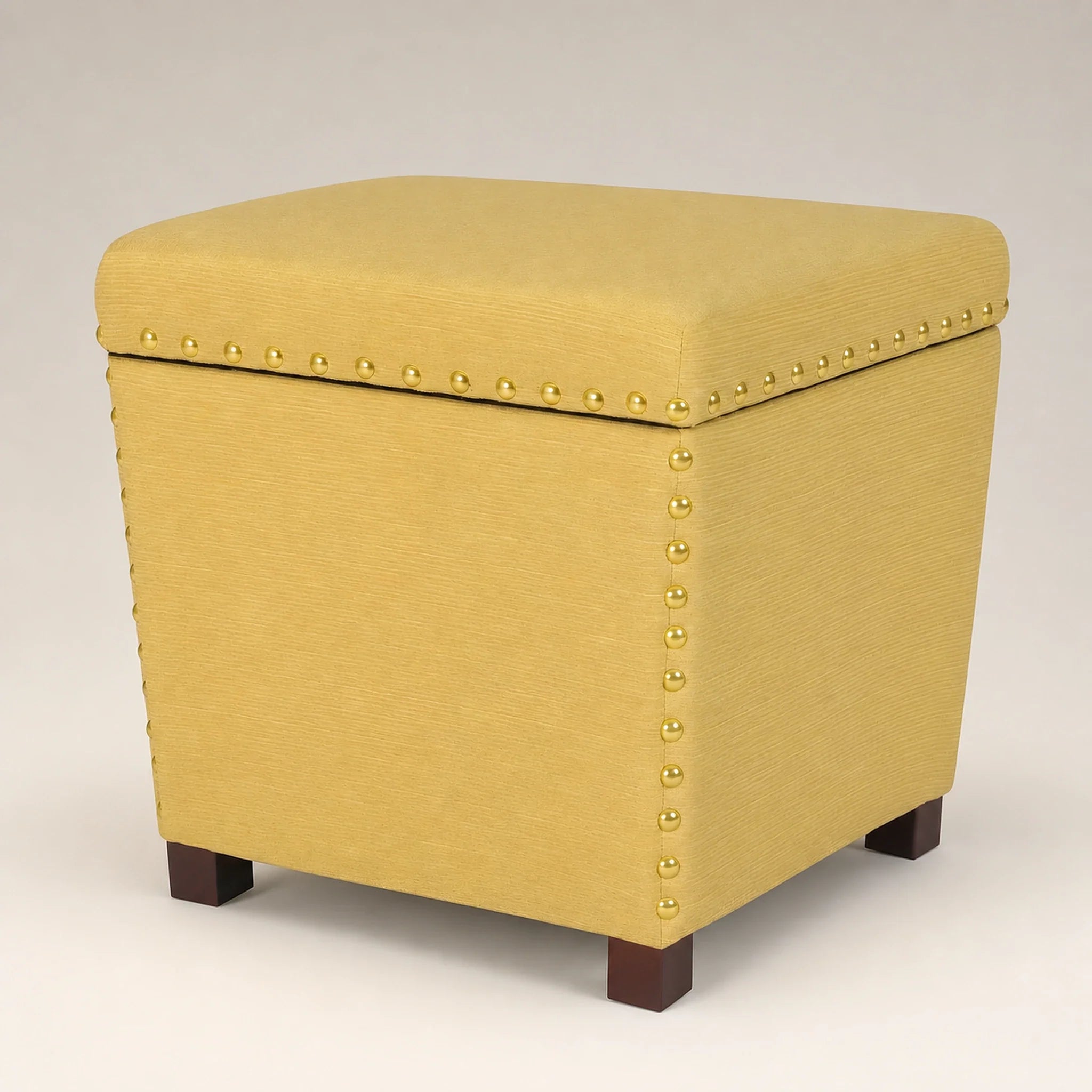 Adeco Yellow storage ottoman – warm studio front view