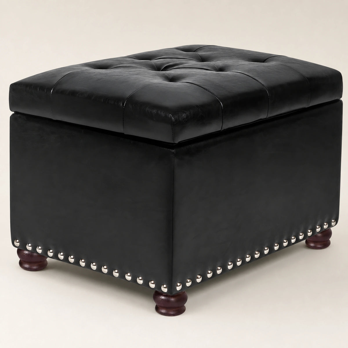 Beringia Black faux leather 17.5-inch storage ottoman – warm studio front view