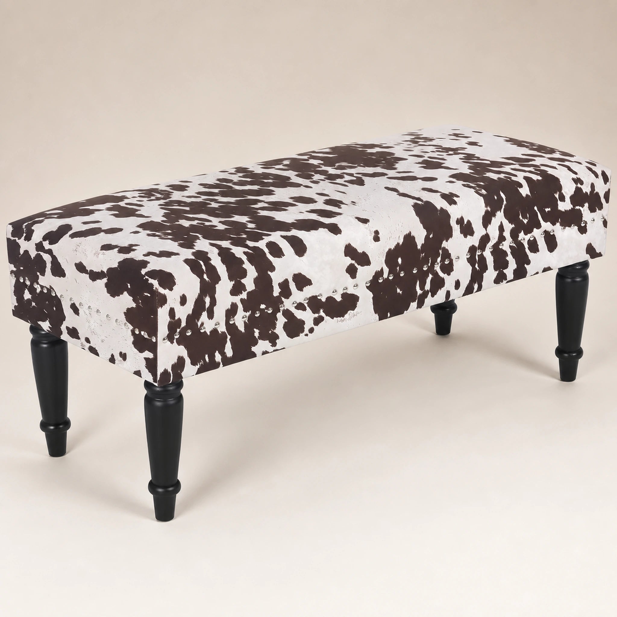 Beringia Brown Cow velvet 39.5-inch storage ottoman – warm studio front view