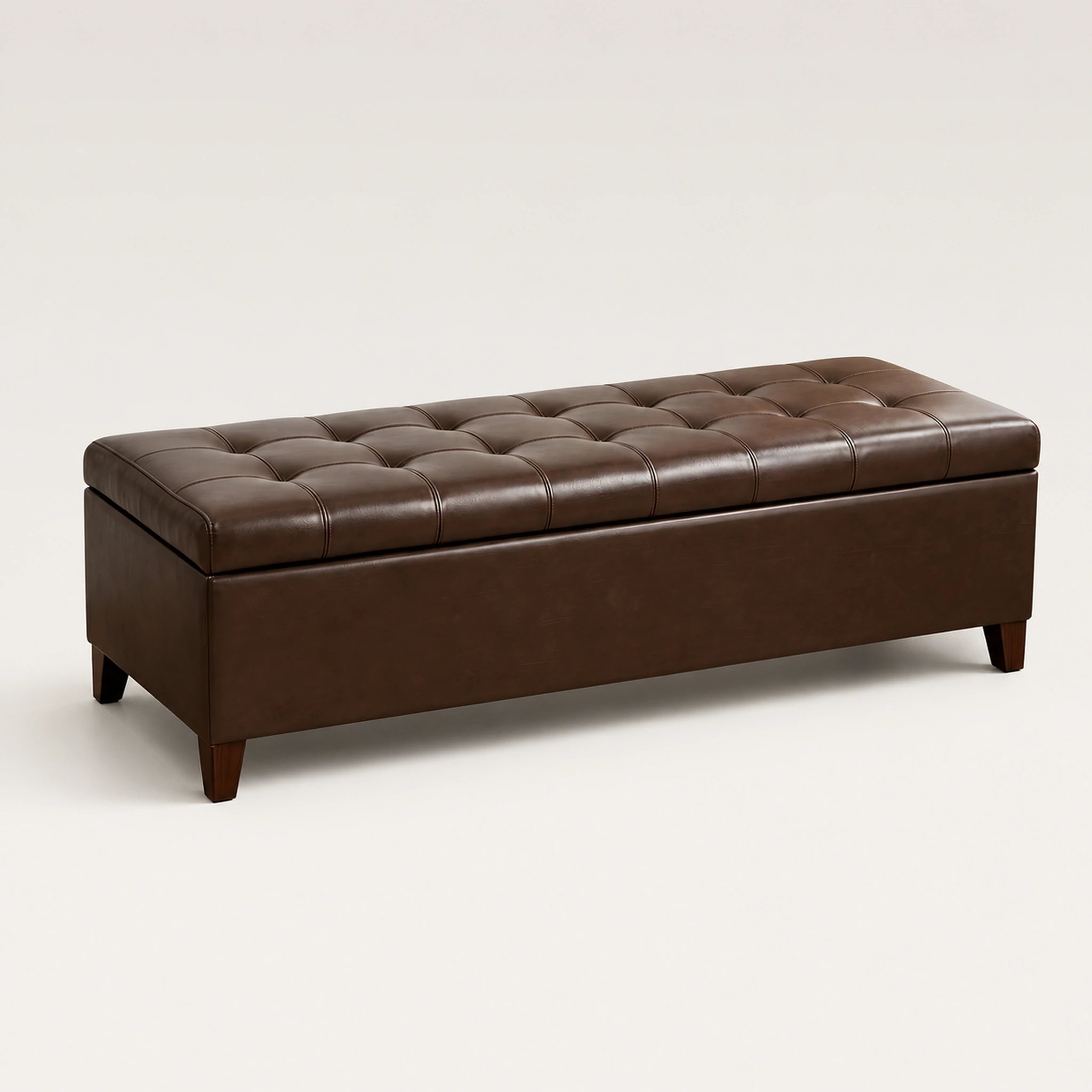 Beringia Brown faux leather 51-inch storage ottoman – warm studio front view