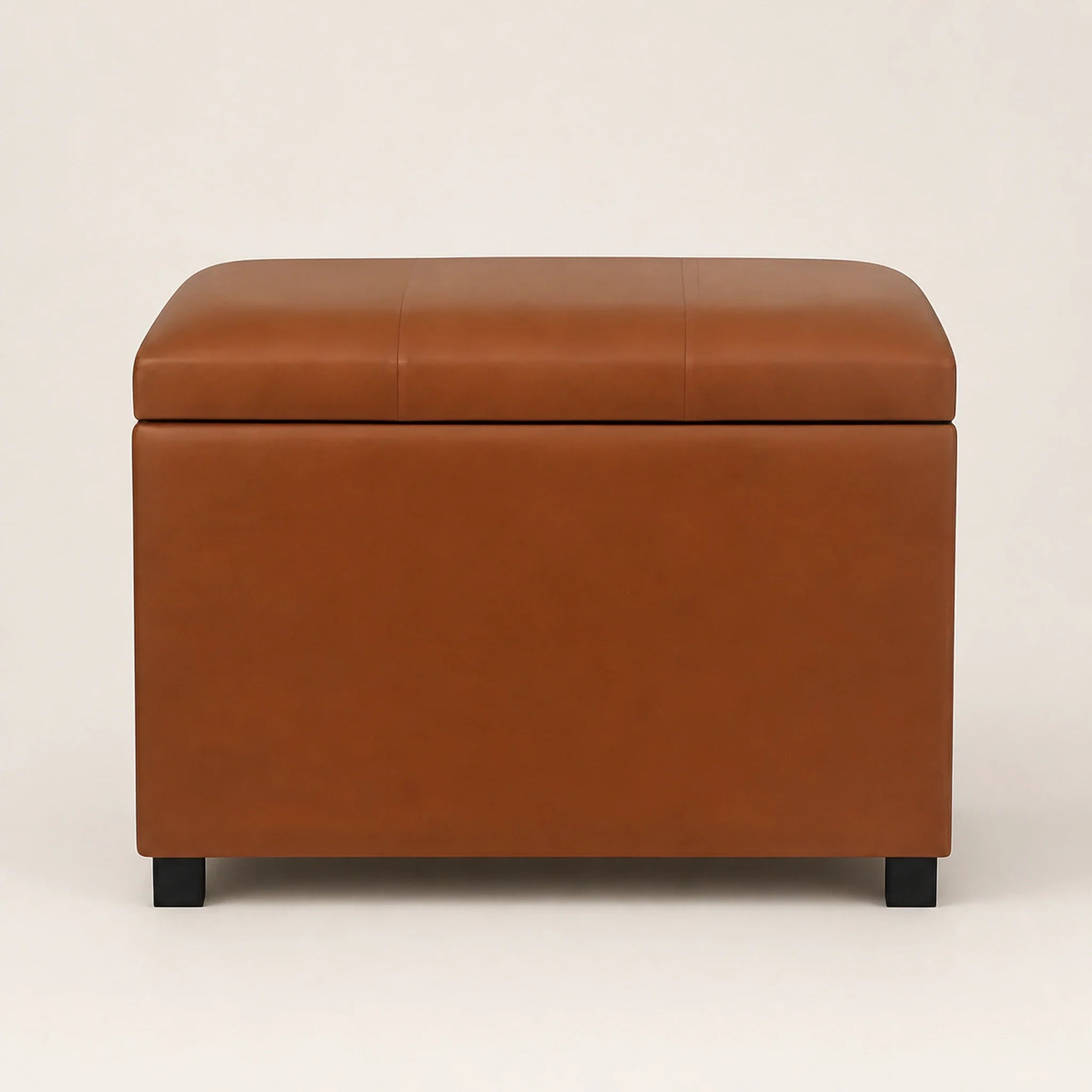 ASense Cognac Brown storage ottoman – warm studio front view