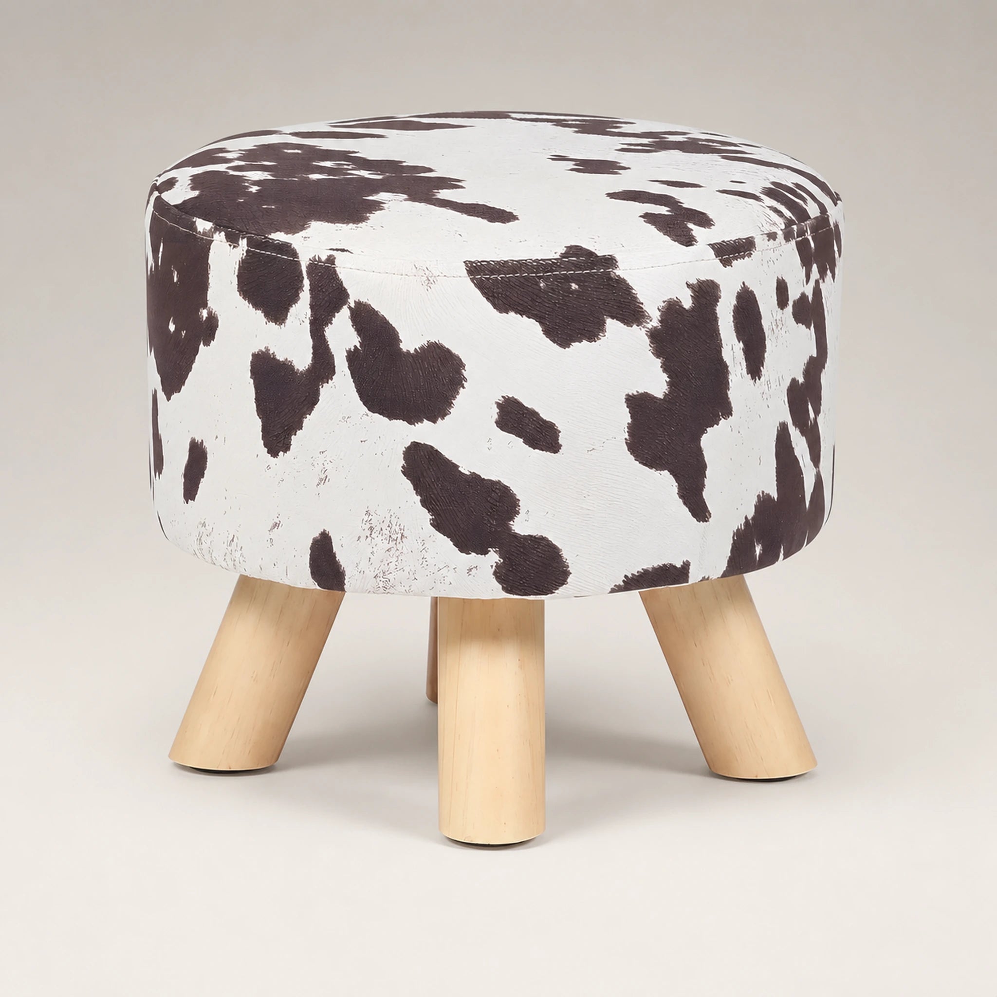 Beringia Cow Brown linen 11-inch storage ottoman – warm studio front view