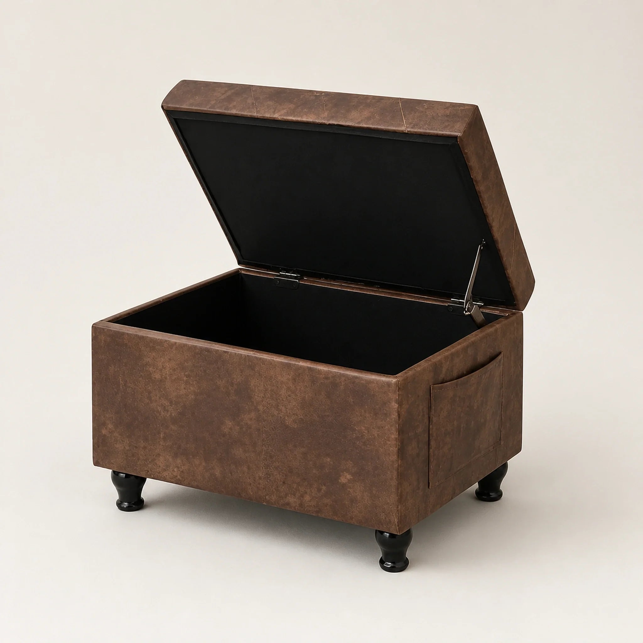 Deco Brown storage ottoman – warm studio front view