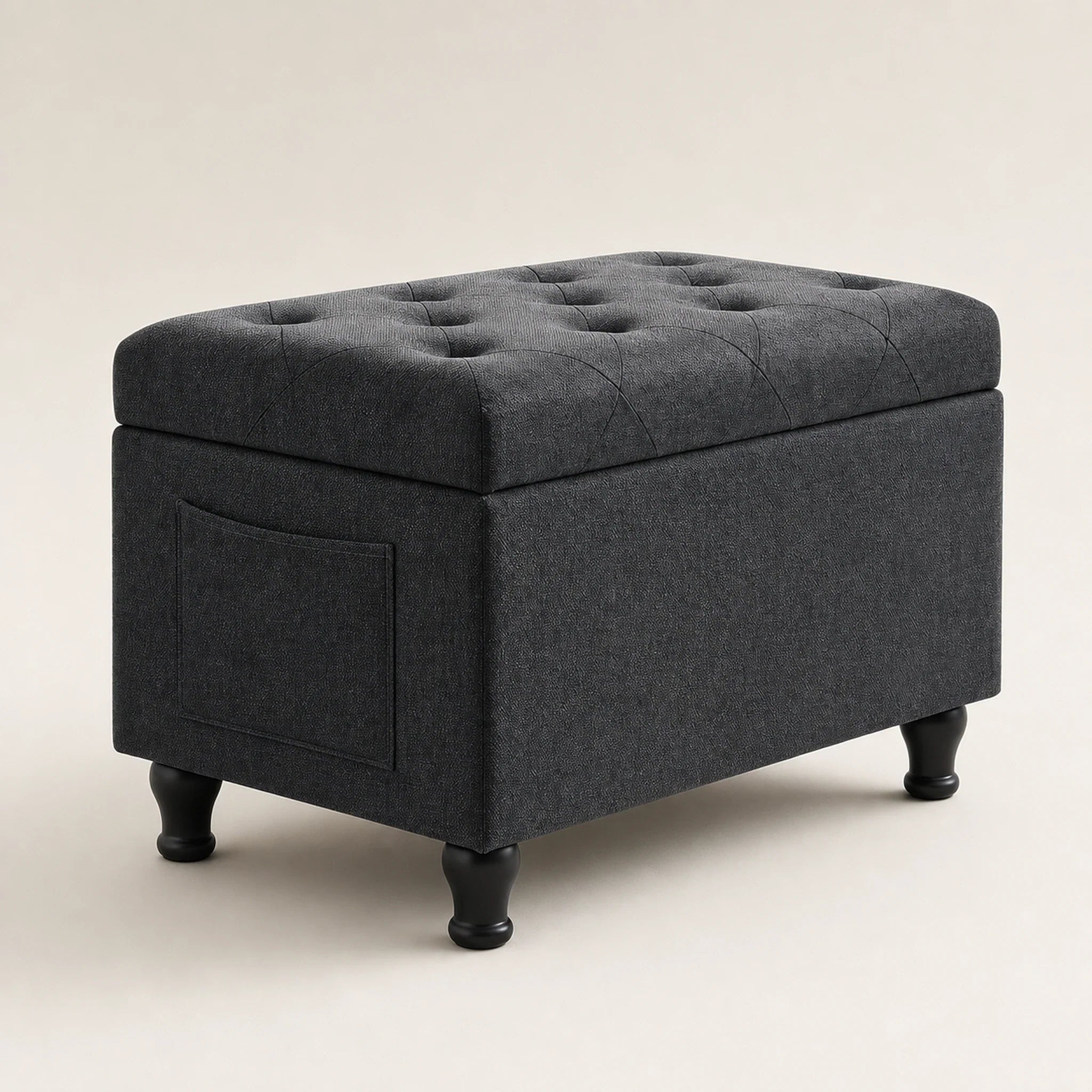 Deco Dark Grey storage ottoman – warm studio front view