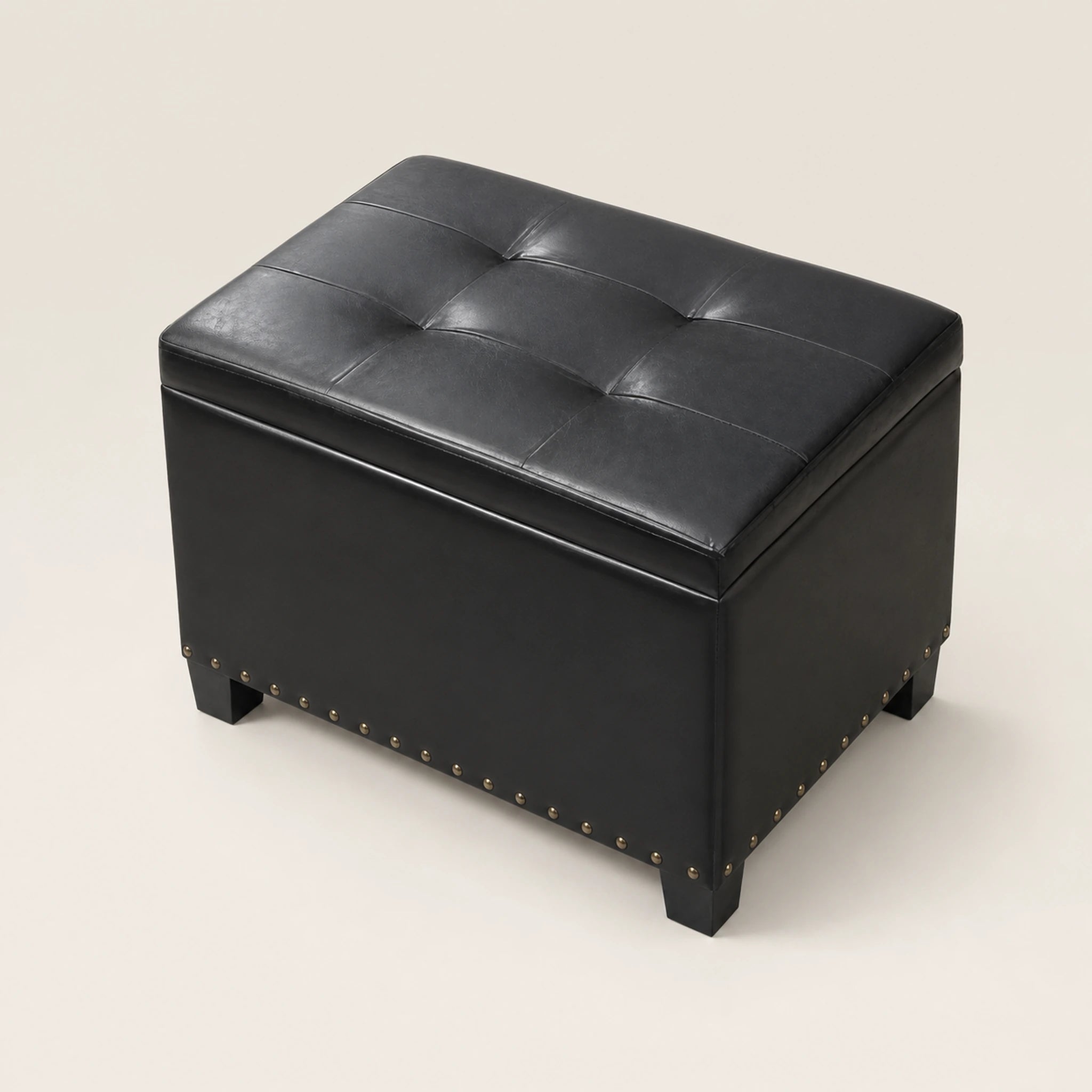 Beringia Black faux leather 21.5-inch storage ottoman – warm studio front view