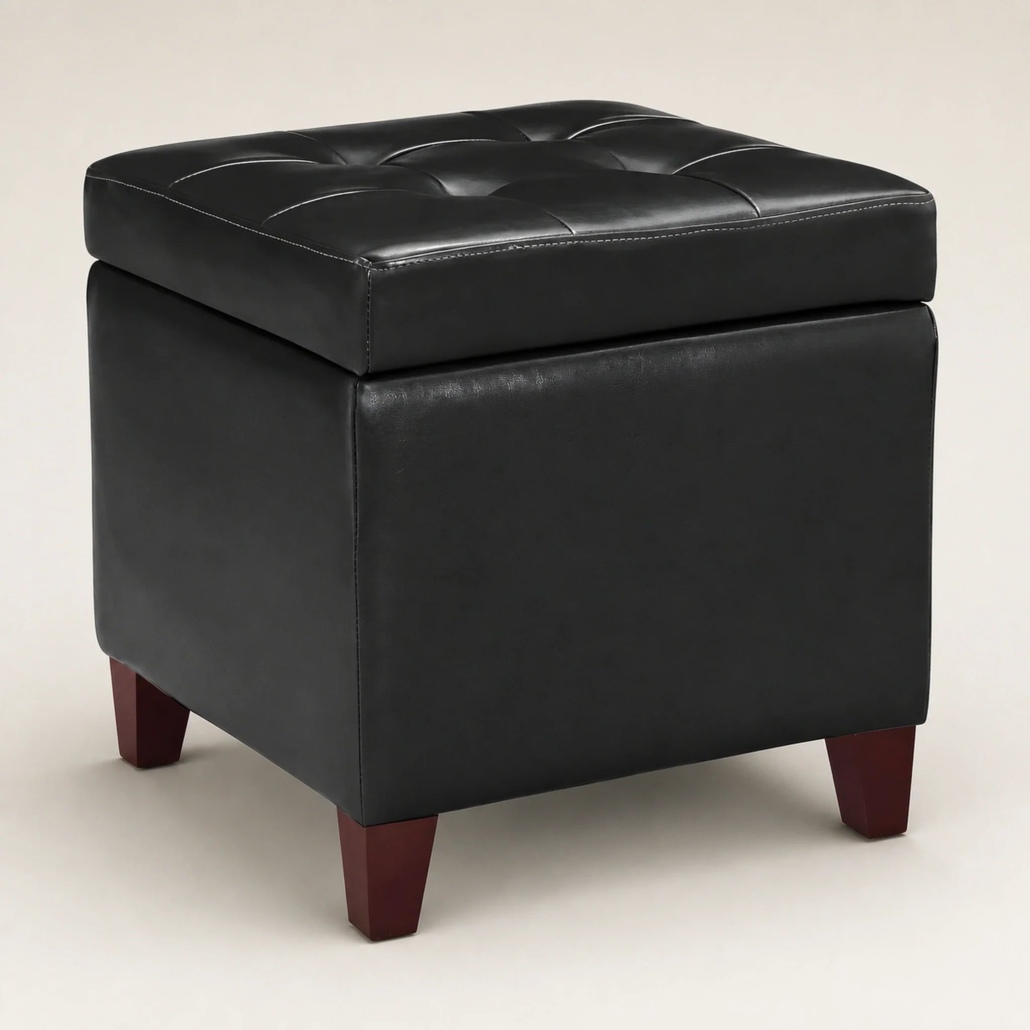 Homebeez Black storage ottoman – warm studio front view