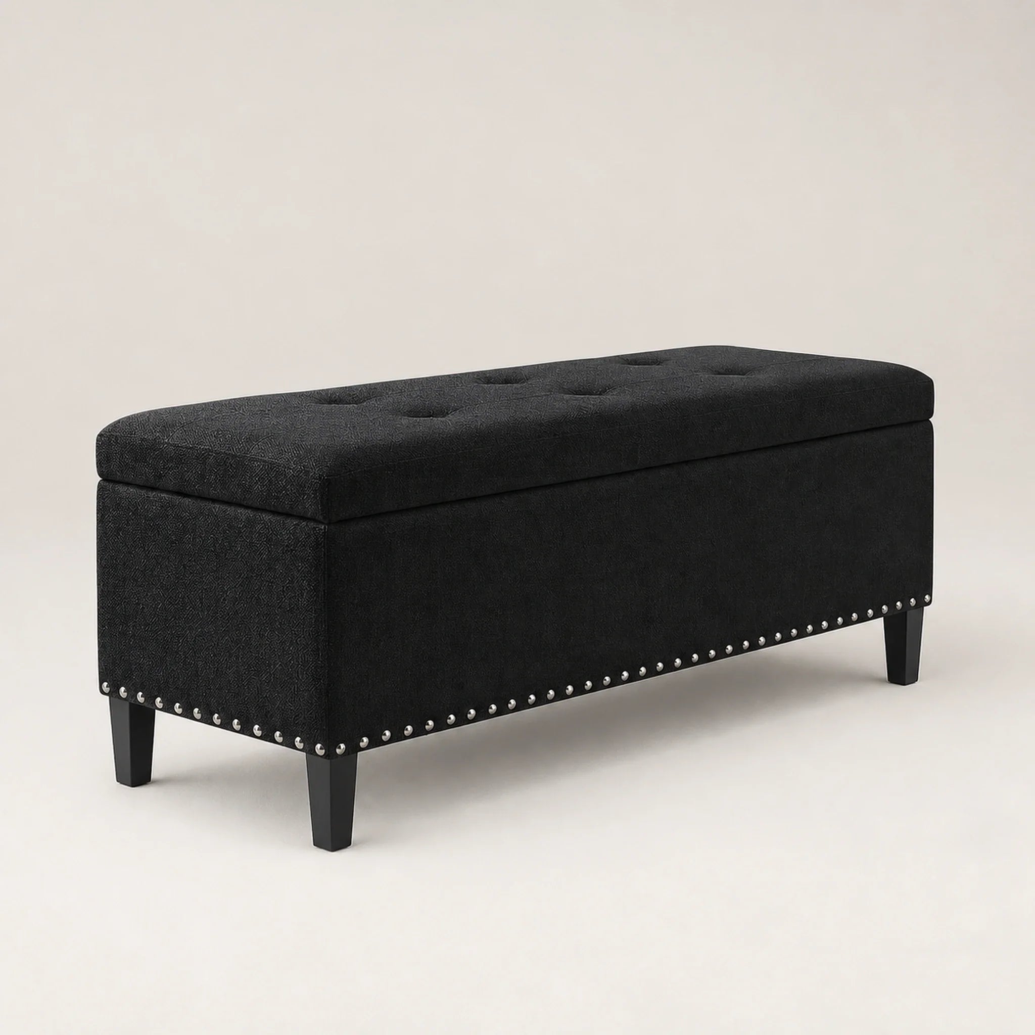 Joveco Black storage ottoman – warm studio front view