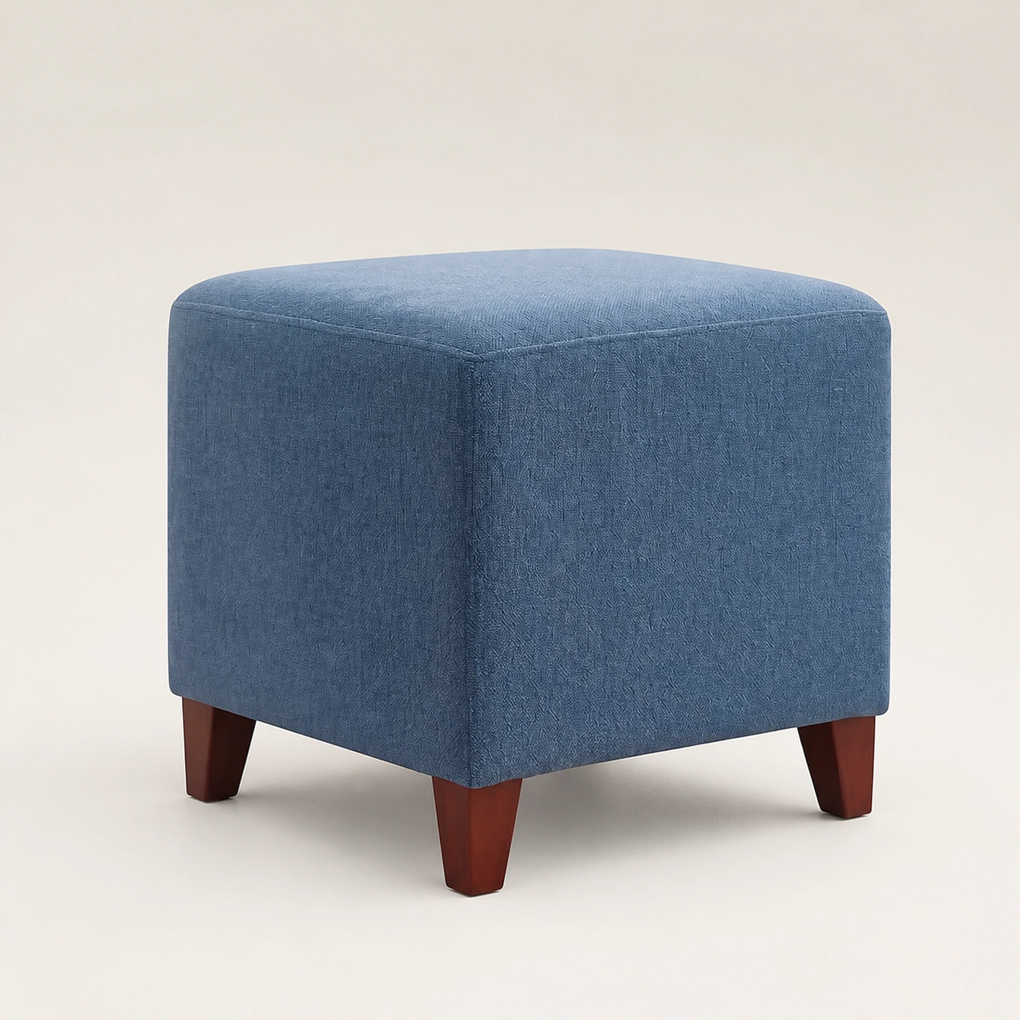 Beringia Blue fabric 16.5-inch storage ottoman – warm studio front view