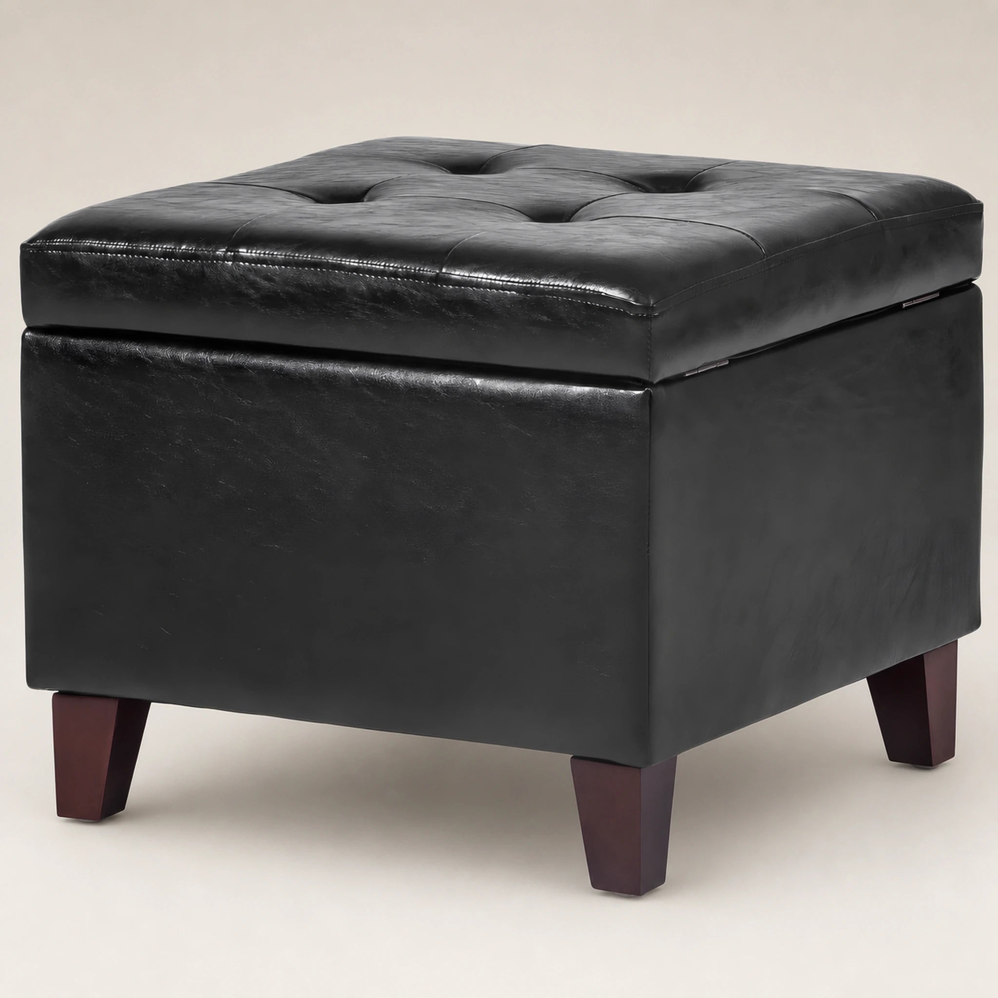 Beringia Style2 Black faux leather 17-inch storage ottoman – warm studio front view