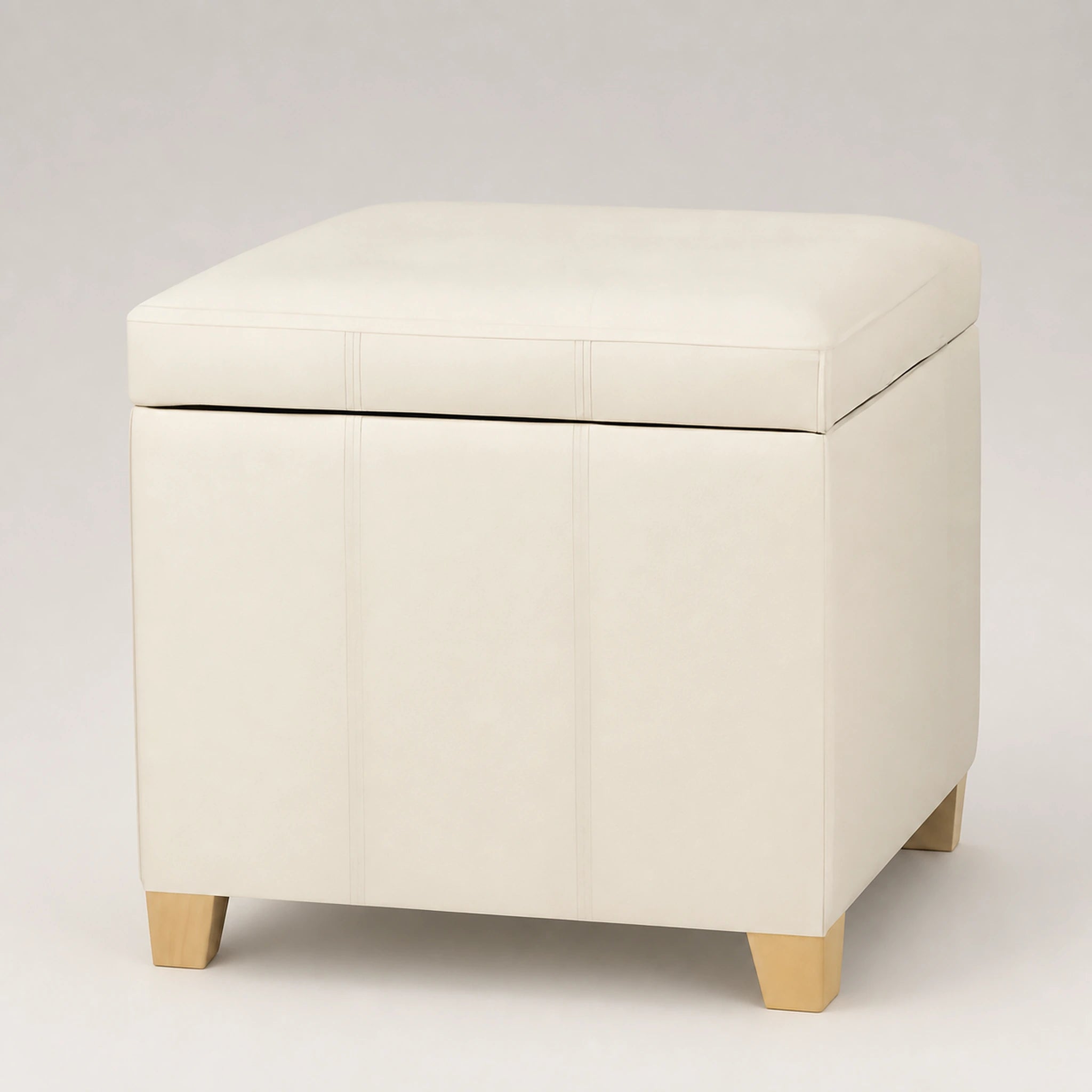 Beringia Style4 Beige faux leather 18.5-inch storage ottoman – warm studio front view